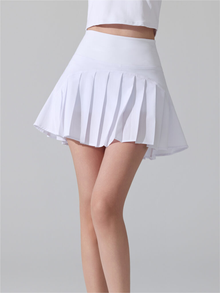 Women's Active Tennis Skirt in White, Cream, Clay Pink, Khaki, Navy worn view